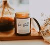 Be Still Amber Glass Jar Soy Candle (lavender, patchouli, and vanilla scent)