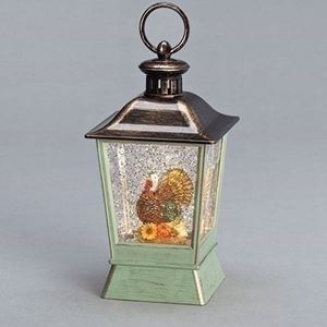 8.75" tall ?LED Lighted Swirl Turkey Lantern ?This constant motion water/glitter swirl lantern is lighted and makes a great fall decoration! Measures 9 inch tall x 4.5" wide x 4.5" deep. 